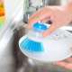 Brosse vaisselle avec compartiment pour liquide vaisselle 