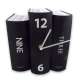 Horloge murale trois livres