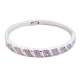 Bracelet rigide argenté orné de plusieurs rangées de strass mauves