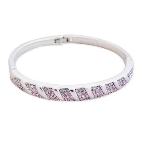 Bracelet rigide argenté orné de plusieurs rangées de strass mauves