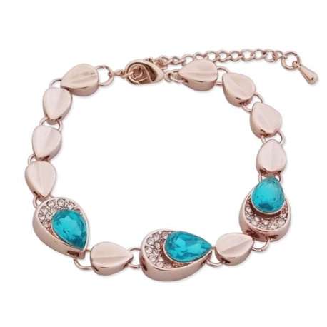 Magnifique bracelet doré, à maillons en goutte, serti de pierre bleu