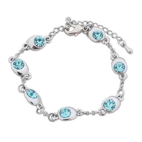 Bracelet fantaisie argenté, agrémenté de 7 petites pierres bleu cie
