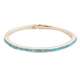 Joli bracelet doré serti de plusieurs petites pierres bleues