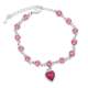 Bracelet argenté avec fausses pierres roses circulaires et en coeur