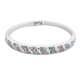 Beau bracelet rigide argenté serti, de strass de couleurs tendres
