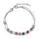 Bracelet à deux branches argentées, embelli par des pierres