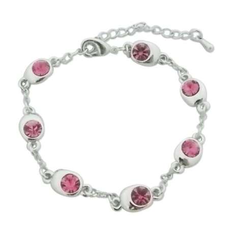 Bracelet argenté: bijoux ovales et faux cristaux roses